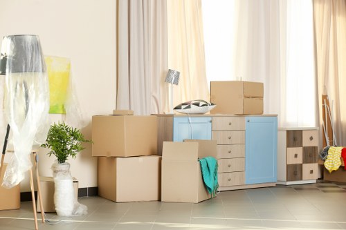 Storage boxes and household items arranged in a Sutton storage space
