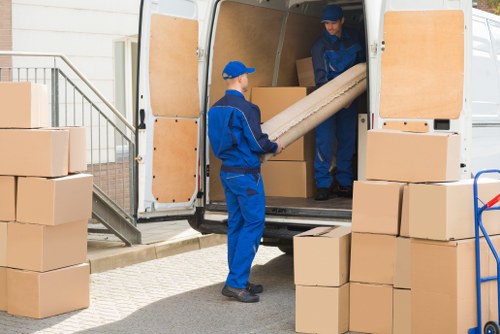 Staff member checking safe storage access at Sutton Storage