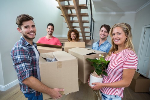 House removals team planning a move in Sutton residential street