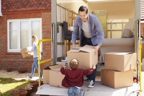 Loading office furniture for transport during a Sutton business move