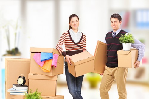 Packed boxes and furniture prepared for a small removal job