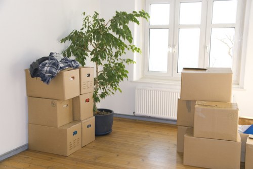 Customer moving boxed items safely in a storage facility