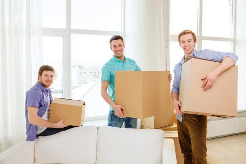 Professional team managing office furniture during a Sutton office move