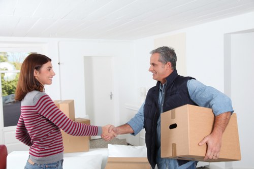A van being loaded with furniture for a Sutton move